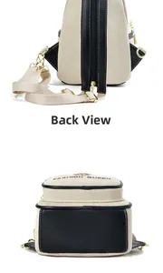 Detailed back view of a beige canvas commuter backpack with black leather trim details