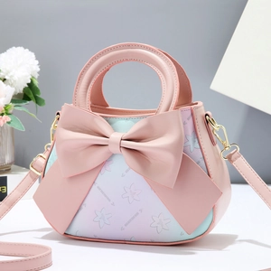 Elegant pink crossbody bag with leather bow and pastel floral pattern for women