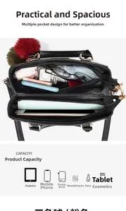 Multi-compartment interior of black pebbled leather handbag showing capacity for iPad mini
