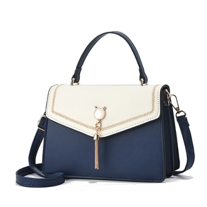 Chic two-tone square crossbody bag with gold tassel and cat-ear bead charm for women