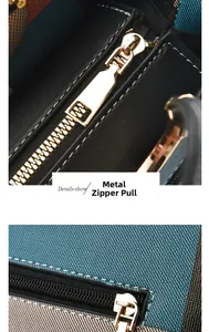 Detail of premium gold-toned zipper head on a two-tone crossbody bag for women