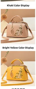 Detail of elegant floral embroidery and pearl leaf pendant on the PU leather handbag