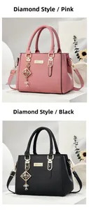 Detail view of pink and black litchi leather handbags with diamond shaped charms