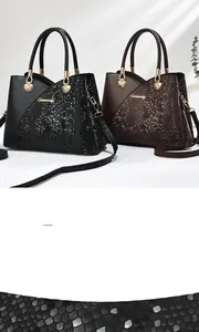 Macro view of embossed snake pattern texture on high-quality PU leather handbag
