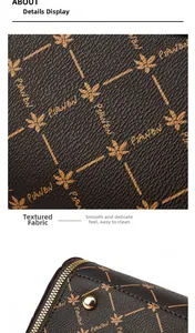 Détail du similicuir marron avec motif de feuille d'érable et fermeture éclair dorée