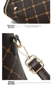 Détail de la base du sac vintage avec rivets dorés et mousquetons en métal doré