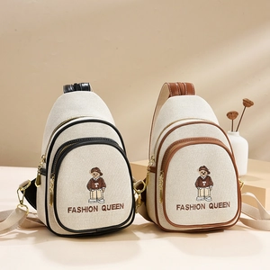 Minimalist canvas crossbody bag with cute bear embroidery and dual zipper design