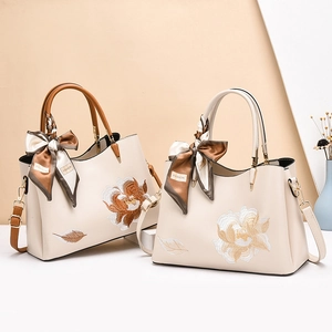 Off-white leather tote bag with floral embroidery, detachable strap and fashion scarf