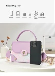 Vue de la capacité interne du sac floral violet pour téléphone et accessoires