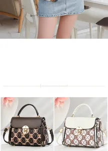 Close-up of monogram plaid crossbody bags in dark brown and creamy white with gold locks