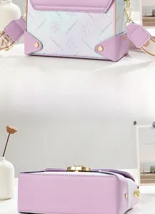 Vue détaillée du sac floral montrant les coins renforcés et la mercerie dorée