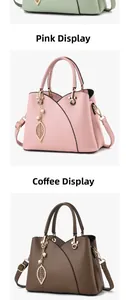 Detail of lychee pattern leather handbag with metal leaf and pearl charm accessories