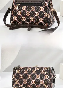 Detail view of the vintage printed bag featuring back zipper and golden bottom studs