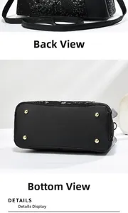 Detail view of black commuter handbag featuring snake skin texture and gold bottom studs