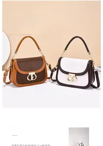 Detail of structured color-block crossbody bags with woven texture and gold ring buckle