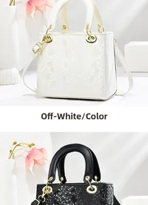 Detail of square snake-patterned handbags in off-white and black with curved top handles