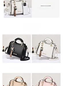 Detail view of large capacity crossbody bag in four colors with a cow charm