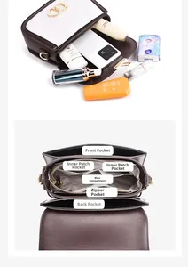 Detailed internal view of contrast color crossbody bag showing multi-compartment storage