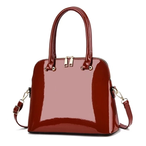 Glossy burgundy patent leather shell bag with gold hardware and dual handles