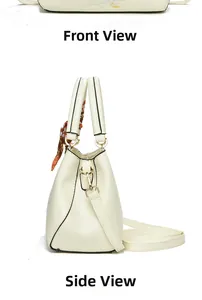 Detail view of cream white tote bag with textured PU leather and floral silk scarf accessory