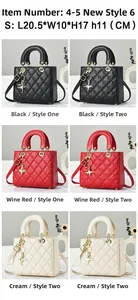 Detail of quilted leather handbag featuring metal star pendant and dual round handles