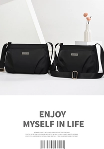 Detailed comparison of two sizes of black nylon crossbody bags with metal logo