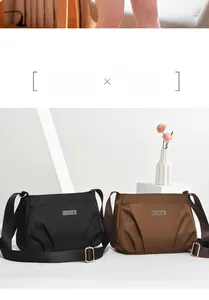 Close-up of minimalist black and brown nylon crossbody bags with metal logo detailing