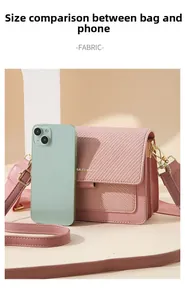 Pink canvas crossbody bag size comparison with a smartphone showing mini dimensions