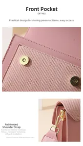 Detail of pink canvas crossbody bag showing woven texture, gold hardware and stitching