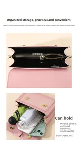 Internal view of pink PU leather crossbody bag showing spacious compartments and storage capacity