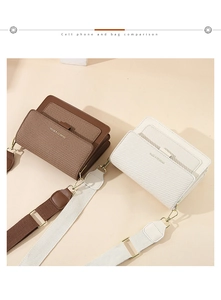 Detail view of woven leather crossbody bags with wide textile straps in brown and beige