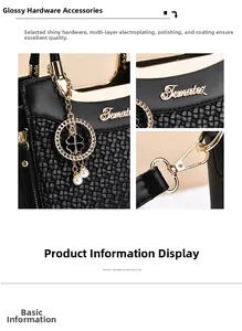 Detail of woven texture black handbag with gold clover charm and polished hardware