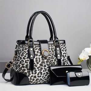 3-piece black and white leopard print tote bag set with patent leather and gold hardware