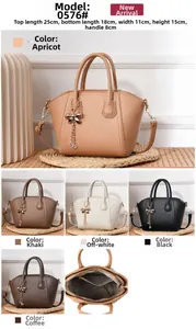 Detailed size specifications and interior layout of shell-shaped crossbody handbag