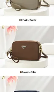 Detail of nylon crossbody bags with multiple zip pockets and a metal triangle logo