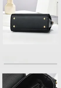 Detail of black lychee leather handbag with golden protective bottom studs and stitching