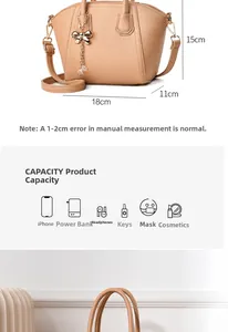 Detail view of apricot textured leather handbag with dimensions 18x15x11cm and metal tassel