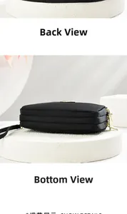Detailed side and bottom views of black nylon shoulder bag with triple gold zippers