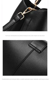 Close-up of polished gold-plated hardware and black lychee texture leather detail