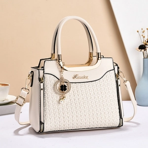 Chic beige woven texture handbag for women with gold logo and crossbody strap