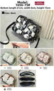 Detailed three-layer zipper structure and floral embroidery on a chic crossbody bag