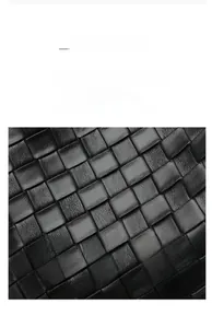 Detail of premium woven black PU leather texture with soft and lightweight finish