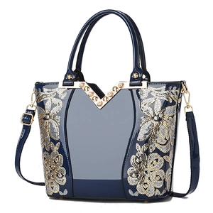 Dunkelblaue Lackleder-Handtasche mit floraler Paillettenstickerei und goldenem V-Detail