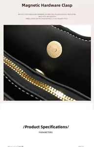 Detail einer mattschwarzen PU-Tasche mit weißen Nähten, Magnetverschluss und Goldreißverschluss