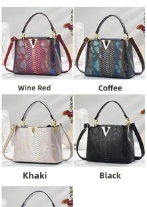 Detail view of crocodile pattern leather handbags in wine red, coffee, khaki, and black