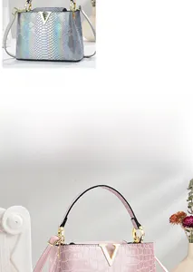 Detail of elegant crocodile pattern leather handbags with luxury gold V metal buckle decoration