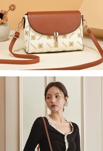 Detail of vintage crossbody bag showing dual-tone faux leather and FOSIDIRI print