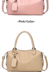 Front view of large leather handbags in pink and beige with gold hardware and shoulder straps