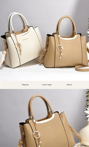 Close-up of pebble grain leather handbags with golden handles and star pearl charms
