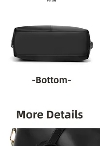 Detail of black leather handbag featuring reinforced bottom and golden metal strap hooks